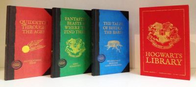 Hogwart's Library : Quidditch Through the Ages, Fantastic Beasts and Where to Find Them, and The Tales of Beedle the Bard.