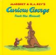 Margaret & H.A. Rey's Curious George feeds the animals